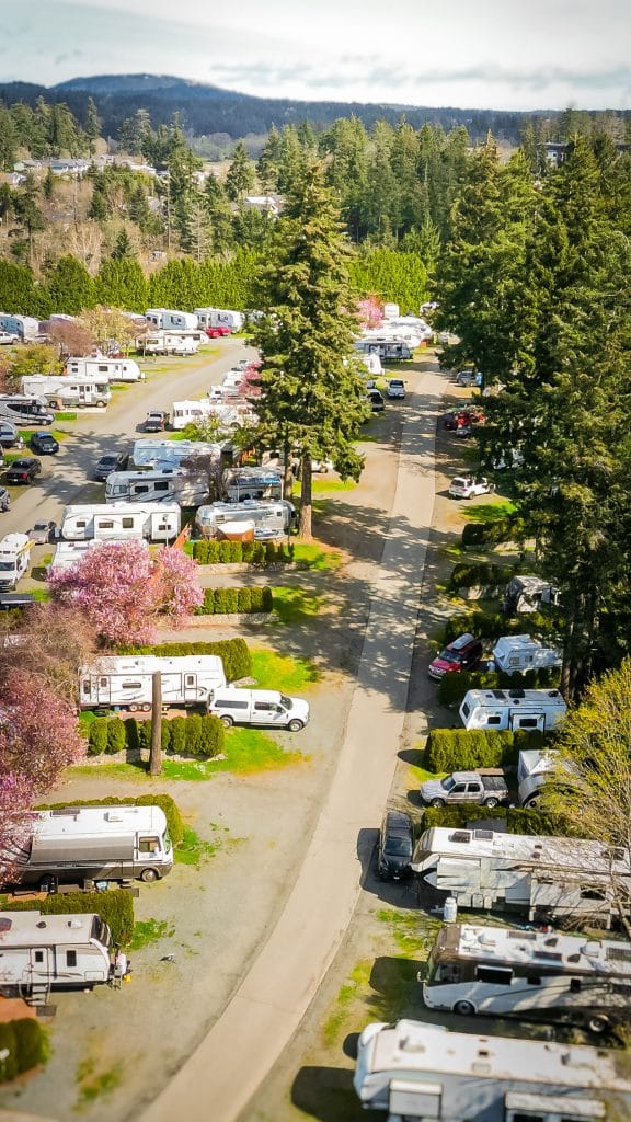 Drone shot of Fort Victoria RV Park showing full layout with cherry blossoms.