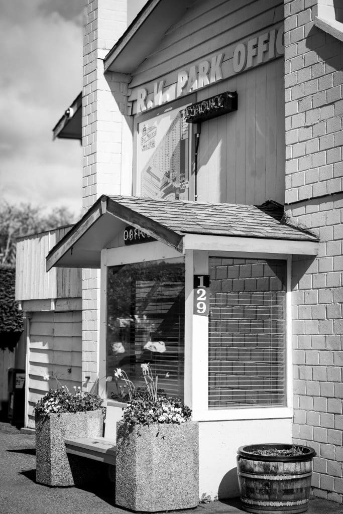 Black and white photo of the RV Park Office entrance at Fort Victoria RV Park.